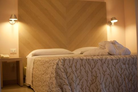 Schlafraum eines Appartements Borgo le Rocce Schlafraum eines Appartements Borgo le Rocce